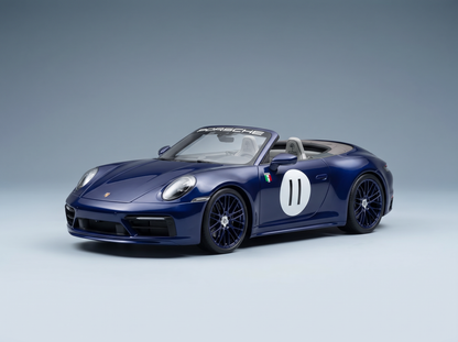 Blaues Porsche 911-Modellauto mit der Startnummer 11, präsentiert von Vroomi für Sammler.