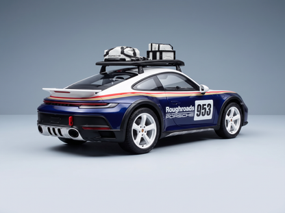 Maqueta a escala del Porsche 953 de Roughroads con portaequipajes en el techo, disponible en Vroomi para coleccionistas