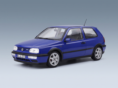 Blue Volkswagen Golf GTI scale model car from Vroomi, detailed replica with alloy wheels and GTI badging