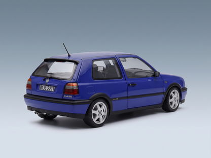 Blue Volkswagen Golf GTI scale model car, detailed replica with alloy wheels, from Vroomi