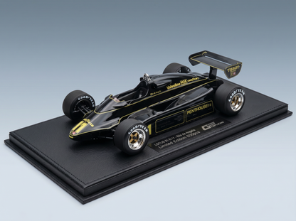 modellino in scala della Lotus 81 di Formula 1, nero e oro, modellino Vroomi, edizione limitata con pneumatici Goodyear e marchio Tissot.