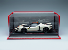 White ferrari 849 testarossa 2025 model car with black accents and orange details in red clear acrylic showcase