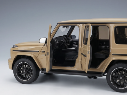 Beige scale model car with open doors, detailed interior, and black rims by Vroomi