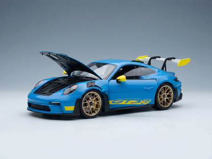 Blue Porsche GT3 R scale model car with open hood, gold wheels, yellow accents — Vroomi