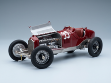 Red vintage race car model #95 with open hood, detailed engine, spoked wheels.