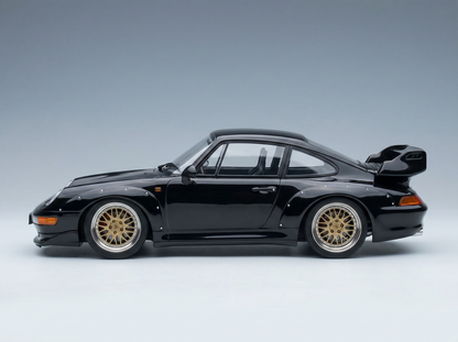 Black Porsche 911 GT2 scale model car with gold rims, showcased by Vroomi for collectors.