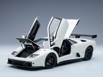 White scale model car with open doors and hood, showcased by Vroomi for collectors
