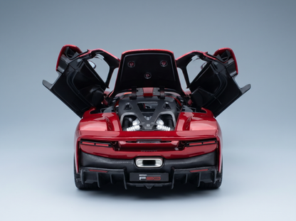 Red Ferrari F80 scale model car with open doors and engine bay, showcased by Vroomi