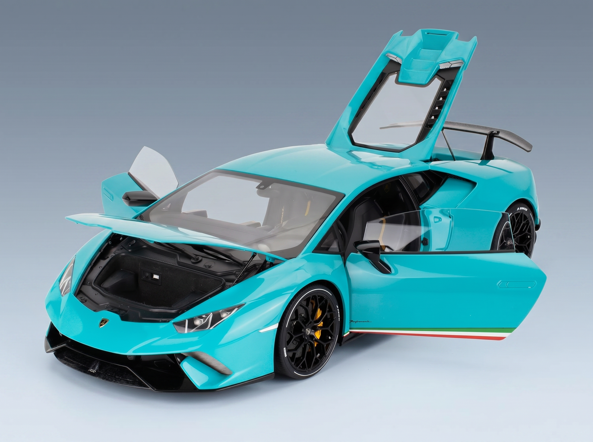 Turquoise Lamborghini Huracán Performante scale model car with open doors and hood, Vroomi