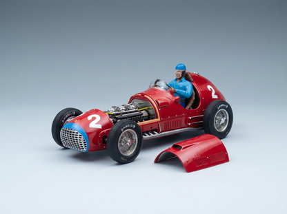 Red scale model car with driver, Pirelli tires, and open engine — Vroomi