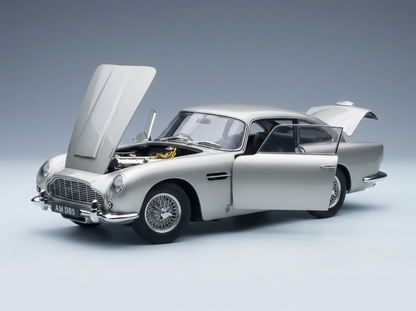 Silver Aston Martin DB5 scale model car with open hood and doors, detailed engine, from Vroomi