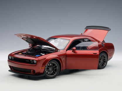 Red scale model car with open hood and trunk, showcased by Vroomi for collectors.
