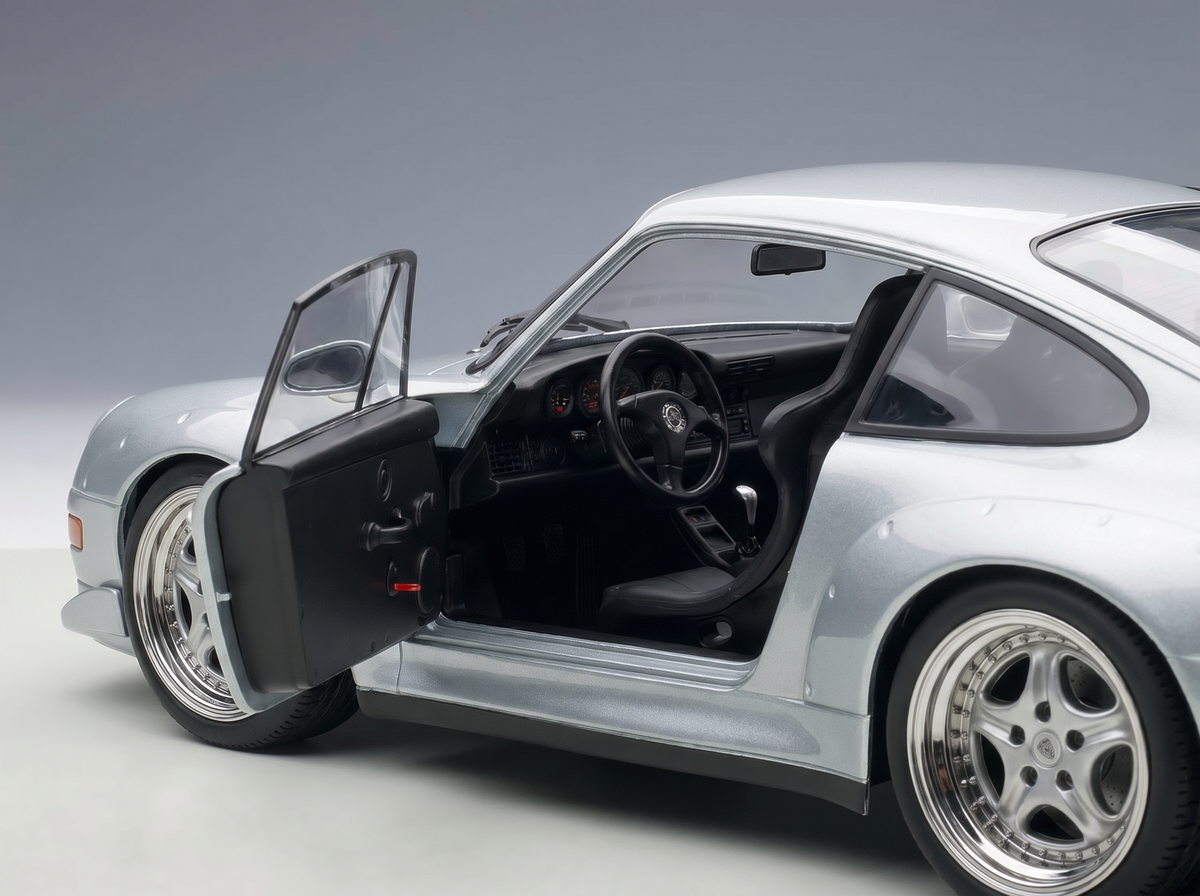 Nano_Banana_Pro_-_High-end_studio_photograph_of_a_single_118_scale_model_car_Single_photograph__sing_81_0863a7fc-0ca8-496d-8193-06ded635323f - Vroomi