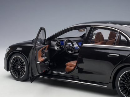 Black Mercedes-Benz scale model car with open door, tan interior, detailed dashboard — Vroomi