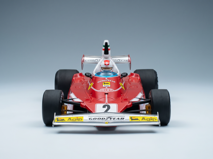 Maqueta a escala de un Ferrari F1 rojo con los logotipos de Goodyear y Agip, con el número 2, de Vroomi