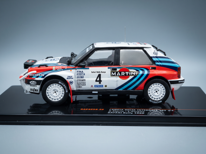 Lancia Delta Integrale 16V Martini No. 4 Alessandro Fiorio Luigi Pirollo Rally Safari 1990 Night Version IXO Models 1:43 scale model - side view on display base