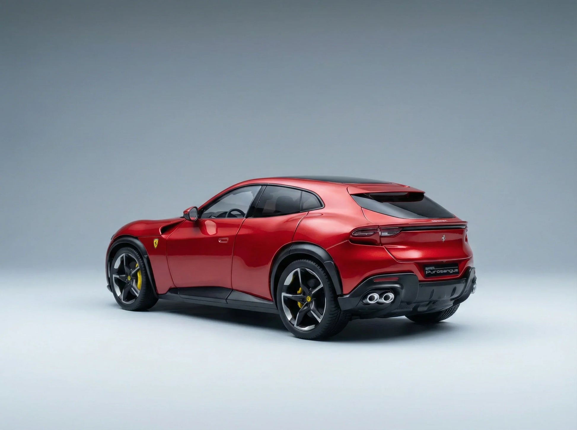Red Ferrari SUV scale model car with detailed wheels, available now at Vroomi for collectors