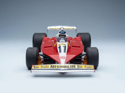 FERRARI – F1 312T3 N 11, SIEGER DES BRITISCHEN GRAND PRIX (mit Fahrerfigur) 1978 CARLOS REUTEMANN – ROT-WEISS Modellauto auf Vroomi