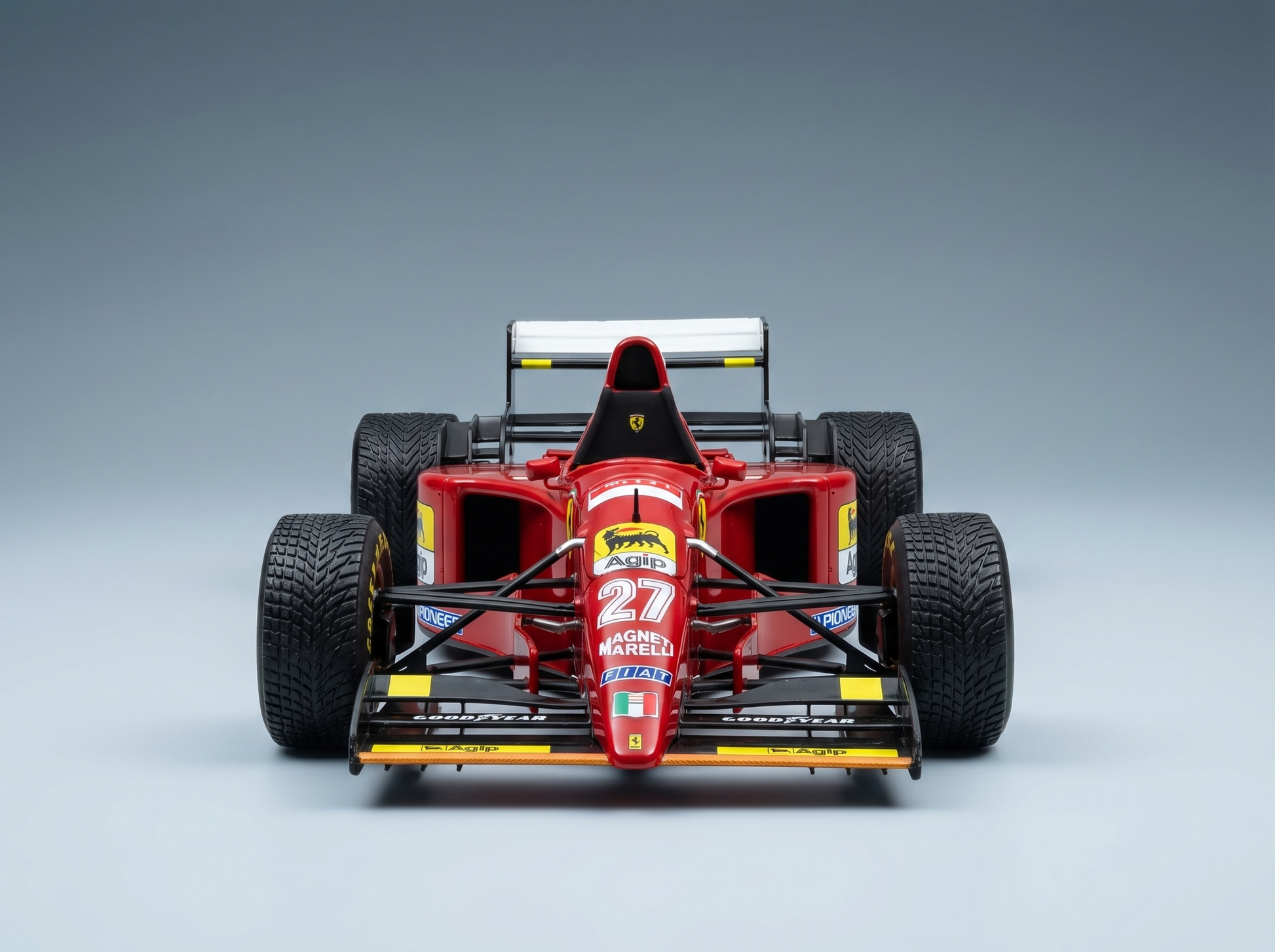 FERRARI – F1 412T2 Nr. 27 GP VON JAPAN MIT REGENREIFEN 1995 JEAN ALESI – ROT-SCHWARZ Modellauto auf Vroomi