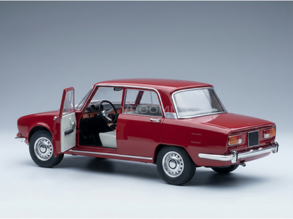 Red scale model car with open door, detailed interior, at Vroomi