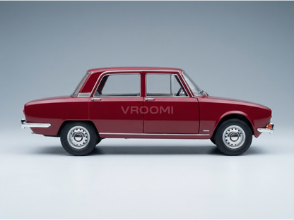 Red classic scale model car with chrome details, showcased by Vroomi for collectors