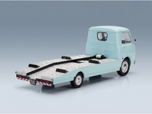Light blue scale model car tow truck with flatbed, detailed die-cast finish, Vroomi collection