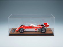 Red and white Alfa Romeo #23 scale model car in display case, featuring Goodyear and Agip branding, perfect for Vroomi collectors.