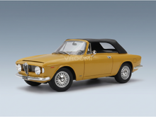 Yellow Alfa Romeo convertible scale model car with black soft top, showcased by Vroomi for collectors.