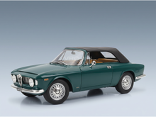 Green Alfa Romeo convertible scale model car with tan interior, showcased by Vroomi for collectors