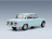 Voiture miniature Alfa Romeo Giulia 1600 Super bleu clair par Vroomi, mettant en valeur le design classique et les détails chromés.