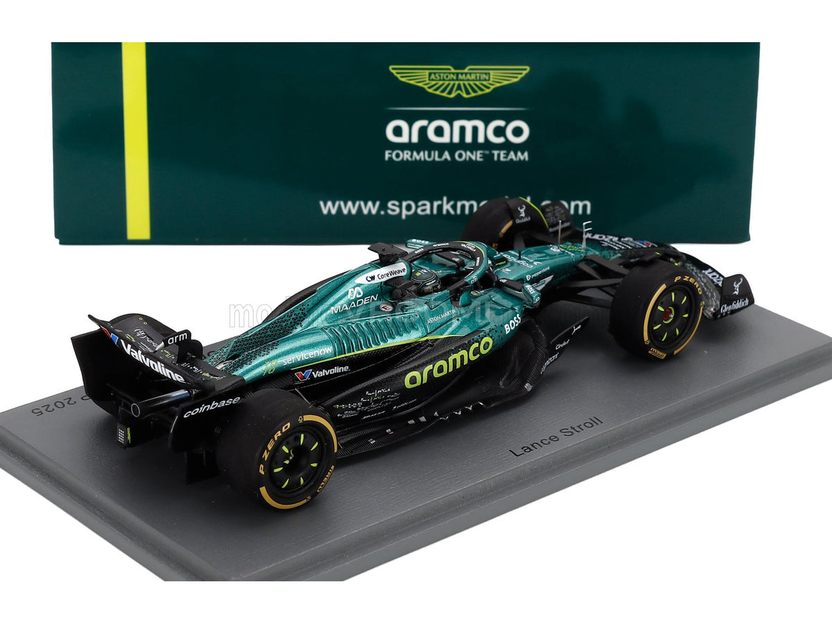 Aston Martin Aramco F1 scale model car by Vroomi, featuring Lance Stroll livery and P Zero tires on display stand.