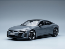 Gray Audi RS e-tron GT scale model car with black roof and red brake calipers, showcased by Vroomi
