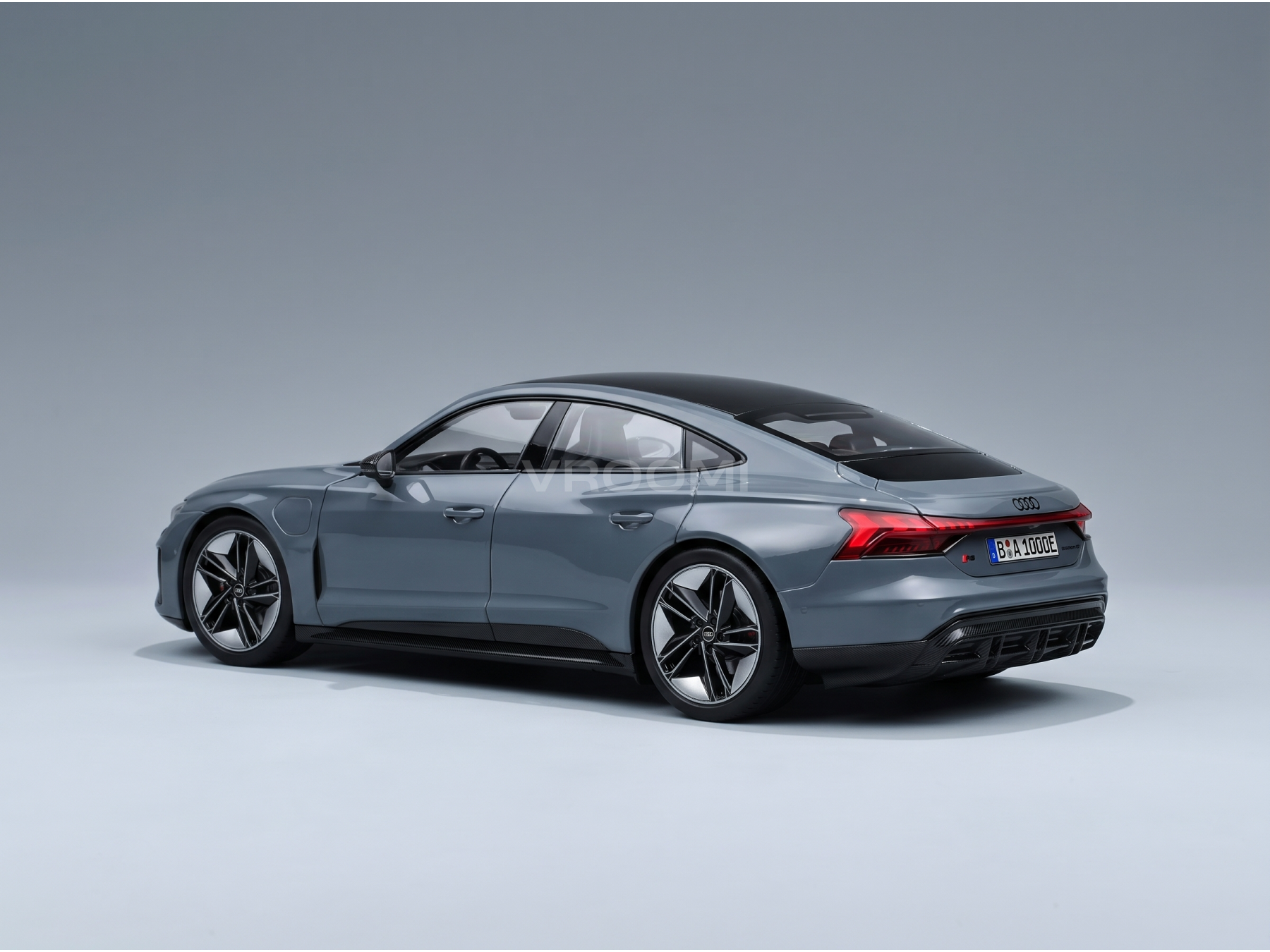 Gray Audi RS e-tron GT scale model car from Vroomi, showcasing sleek design and detailed wheels.