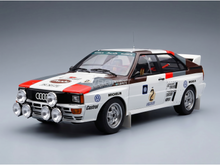 Audi Sport scale model car with racing decals, showcased by Vroomi for collectors.