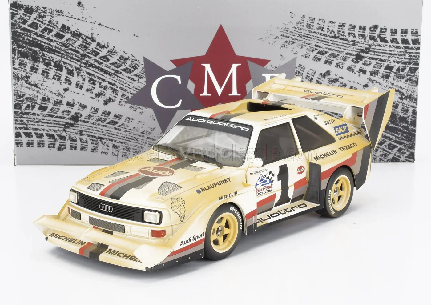 Audi Quattro scale model car with Pikes Peak livery, displayed by Vroomi for collectors