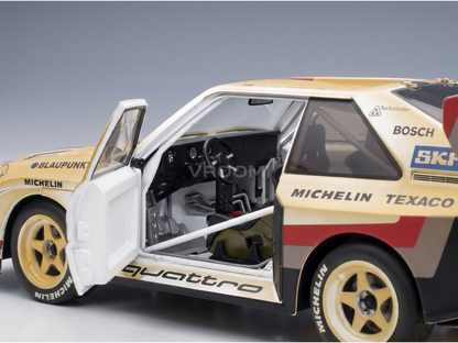 AUDI - QUATTRO SPORT S1 E2 N° 1, VAINQUEUR DU RALLYE DE PIKES PEAK (COURSE DE MONTÉE) - VERSION « DIRTY » - 1987, W. ROHRL - JAUNE, BLANC, ROUGE