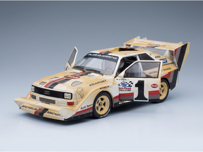 AUDI - QUATTRO SPORT S1 E2 N° 1, VAINQUEUR DU RALLYE DE PIKES PEAK (COURSE DE MONTÉE) - VERSION « DIRTY » - 1987, W. ROHRL - JAUNE, BLANC, ROUGE