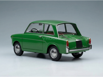 Grünes Oldtimer-Modellauto mit Chromdetails, präsentiert von Vroomi für Sammler und Liebhaber.