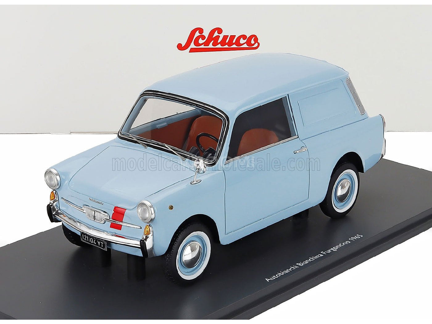 Light blue Autobianchi Bianchina Furgoncino 1965 scale model car by Schuco, displayed on black base — Vroomi
