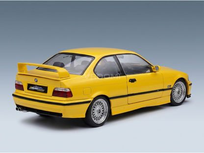 Yellow BMW E36 M3 scale model car with rear spoiler, showcased by Vroomi for collectors