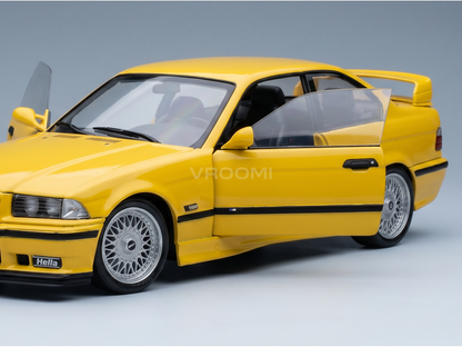 Yellow BMW M3 E36 scale model car with open doors, detailed wheels, and Vroomi branding