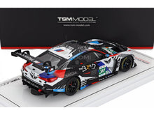 BMW M4 GT3 #31 scale model car by TSM Model, featuring racing livery, displayed on Vroomi base