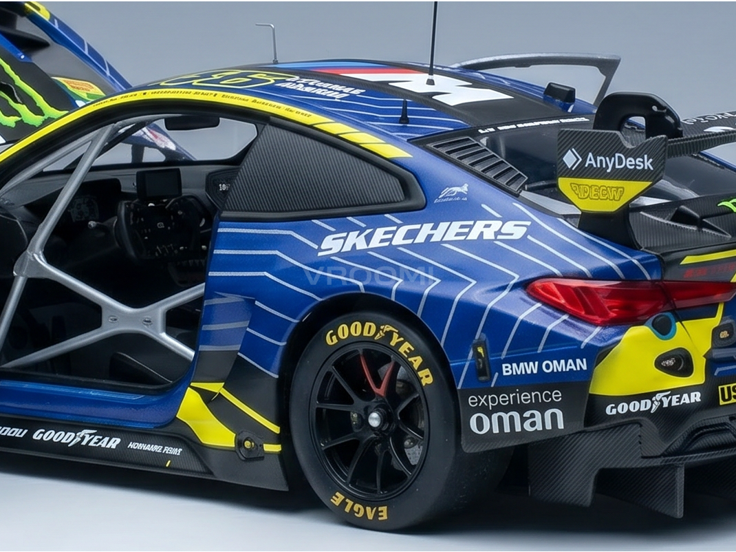 Blue and yellow BMW M4 GT3 scale model car with Skechers, Goodyear, and Oman livery, featuring open door and roll cage, from Vroomi.