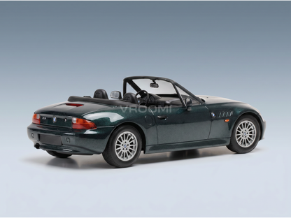 Green BMW Z3 scale model car from Vroomi, detailed die-cast convertible with silver rims and black interior.