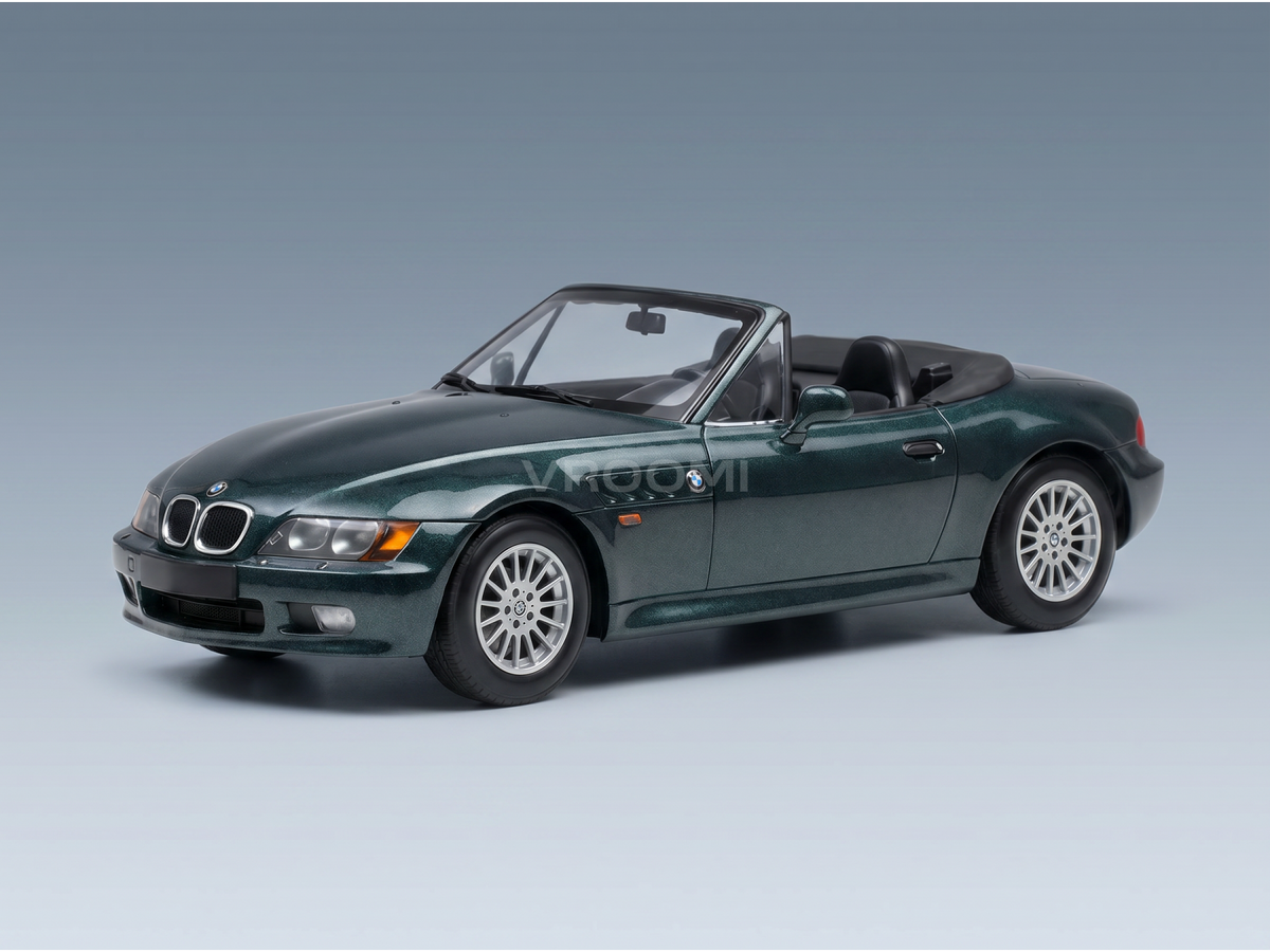 Green BMW Z3 scale model car from Vroomi, detailed die-cast replica with black soft top and silver rims