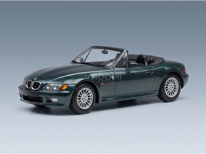 Green BMW Z3 scale model car from Vroomi, detailed die-cast replica with black soft top and silver rims