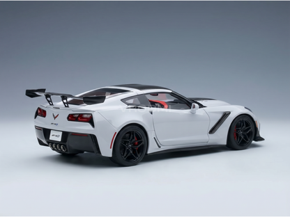 White Corvette ZR1 scale model car with black wheels and rear wing, showcased by Vroomi