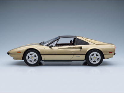 Gold Ferrari 308 GTS scale model car from Vroomi, showcasing detailed die-cast design and classic sports car styling.