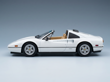 White Ferrari 328 GTS scale model car with tan interior, showcased by Vroomi for collectors