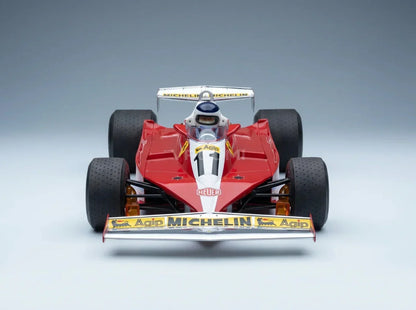 FERRARI - F1 312T3 N 11 WINNAAR BRITSE GP (met coureurfiguurtje) 1978 CARLOS REUTEMANN - ROOD-WIT Vroomi Schaalmodellenwinkel